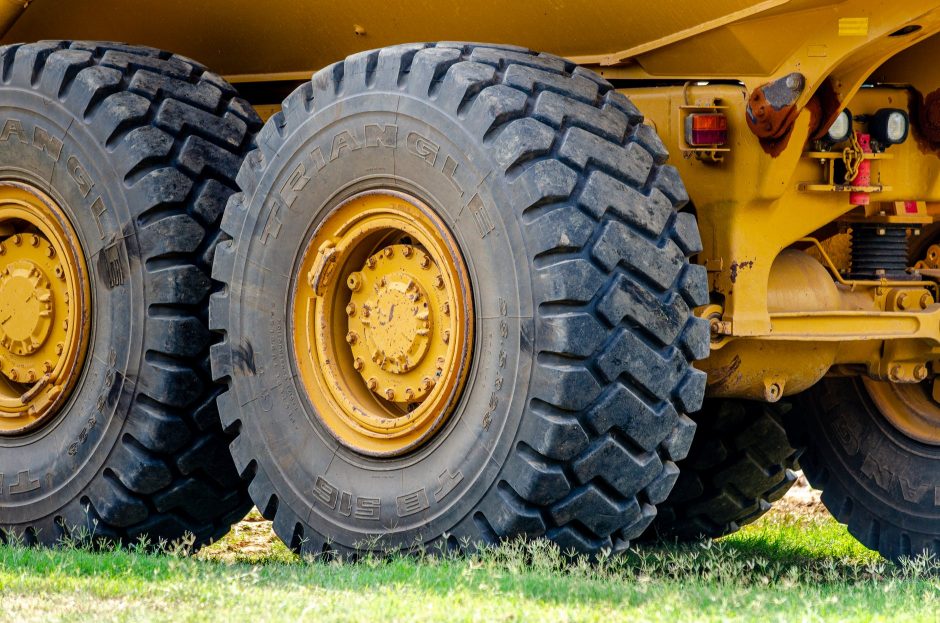 yellow and black utility truck wheel