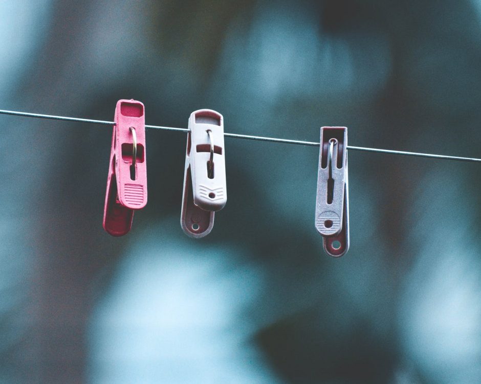 three clothespins on clothesline